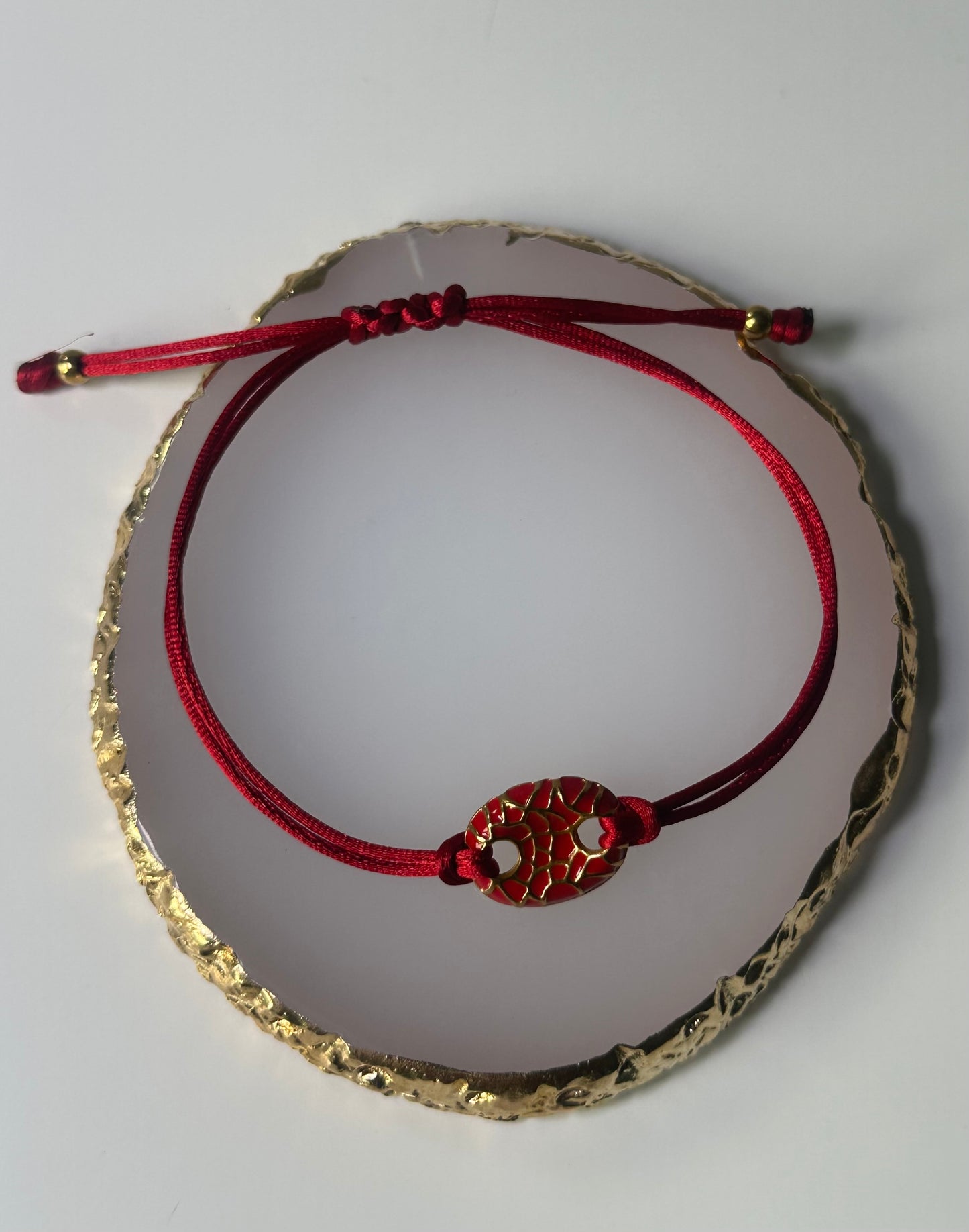 Red and gold adjustable bracelet