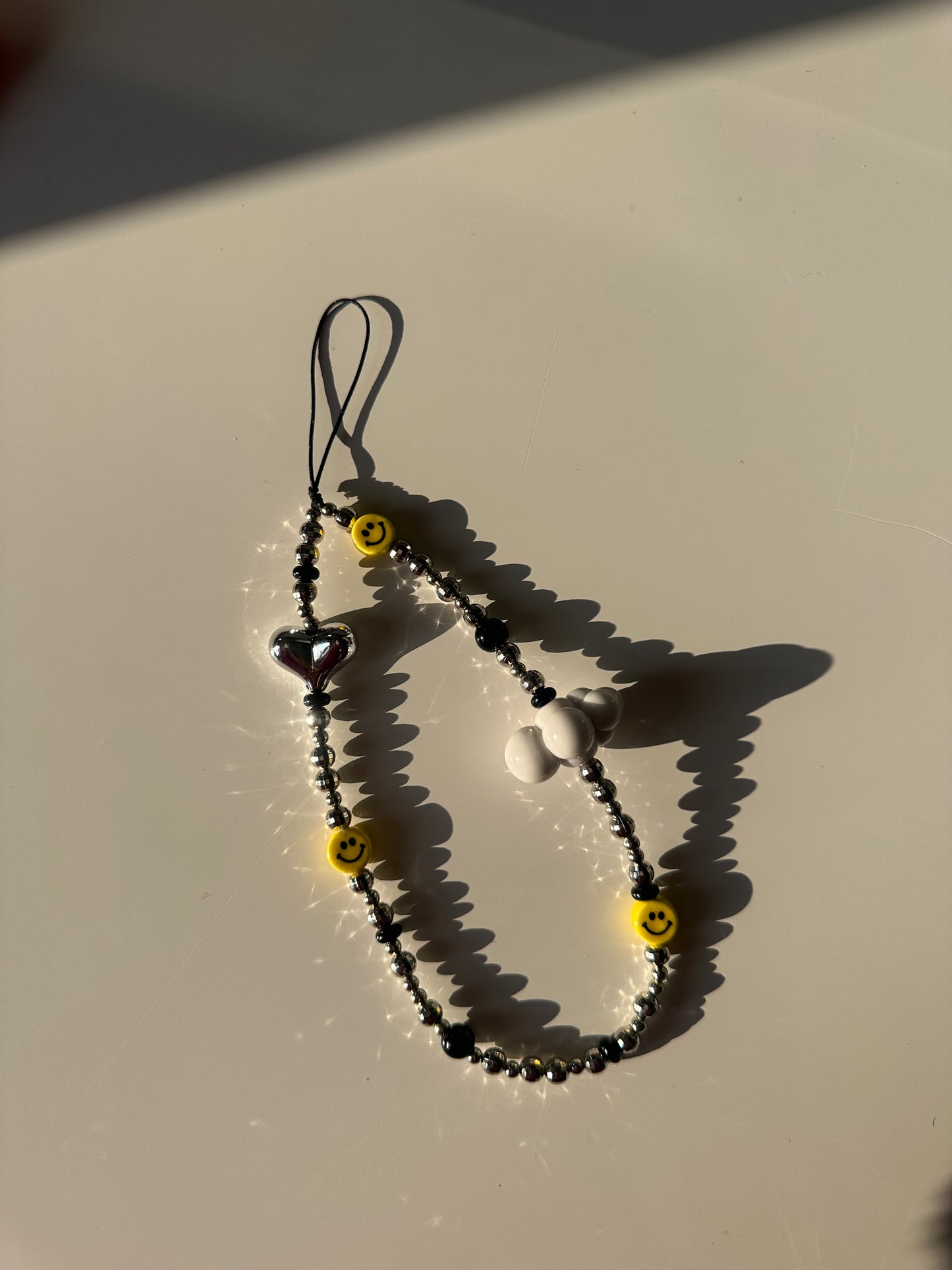 Smiley phone charm