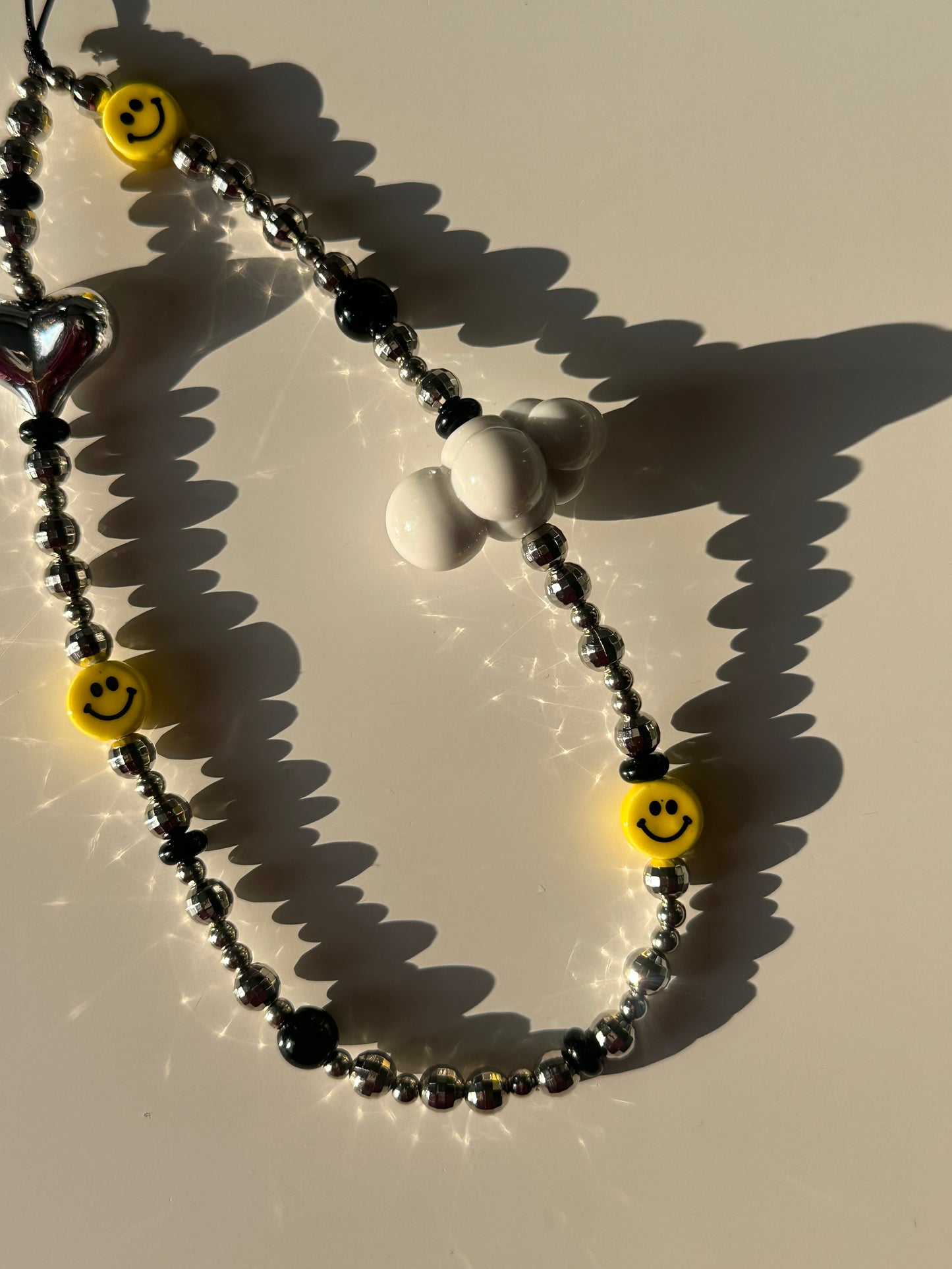 Smiley phone charm