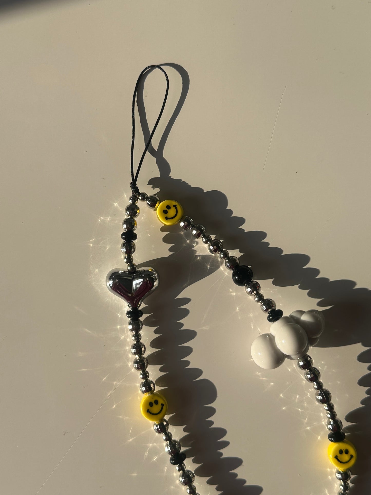 Smiley phone charm