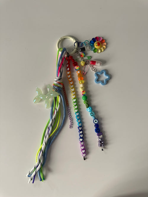 Abby bag charm (cream)