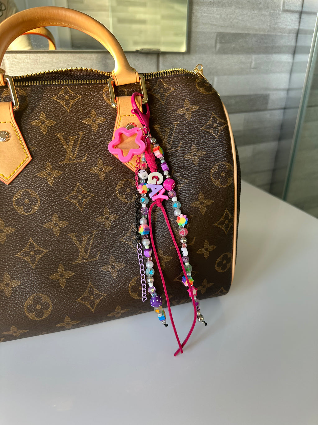 GAY bag charm