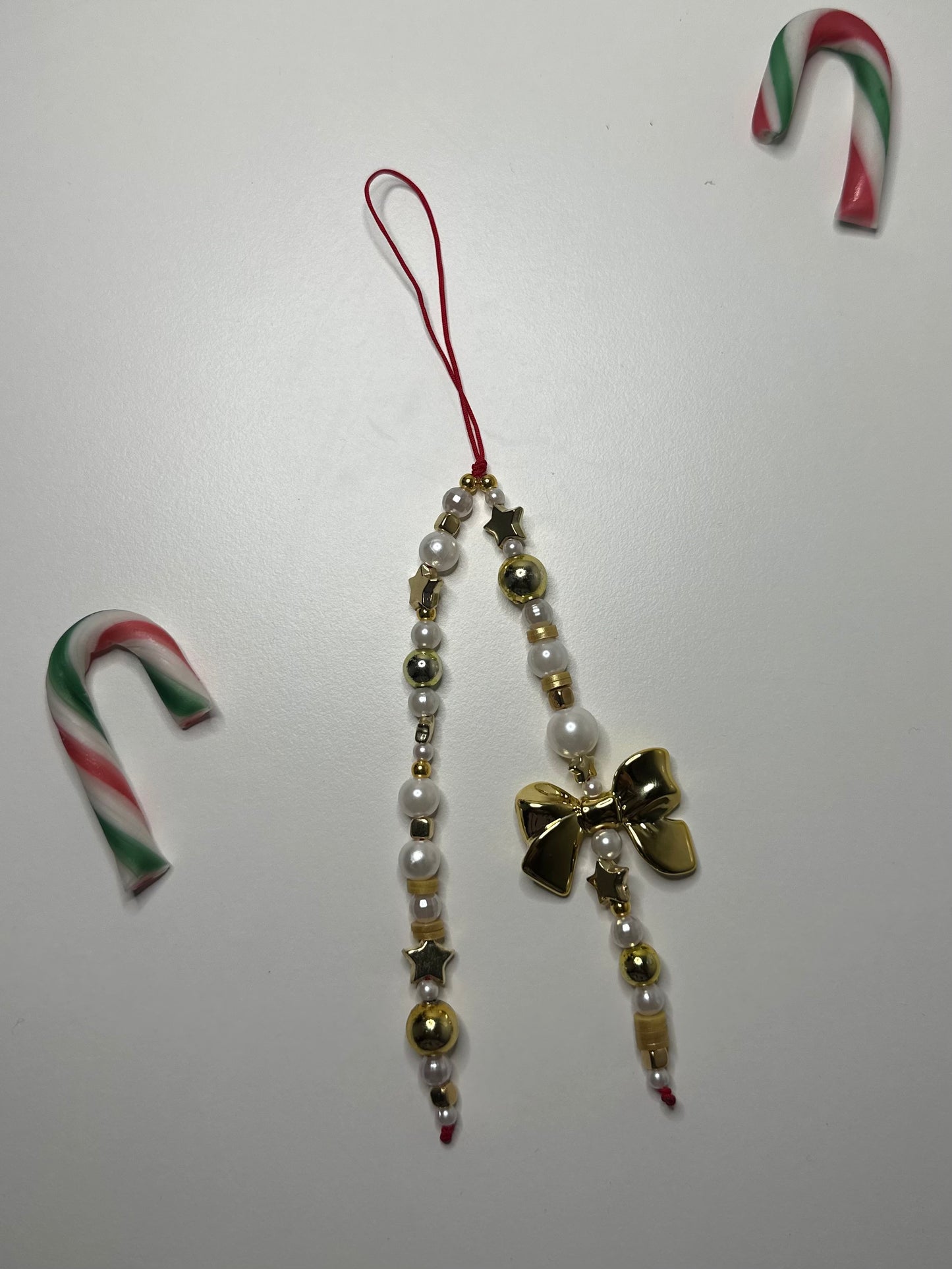 Gold bow charm