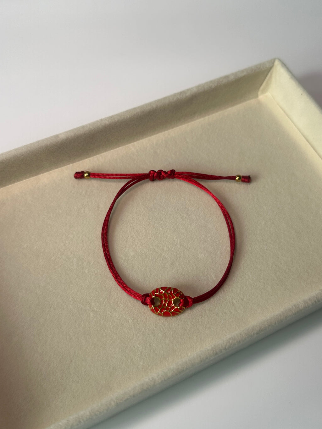 Red and gold adjustable bracelet
