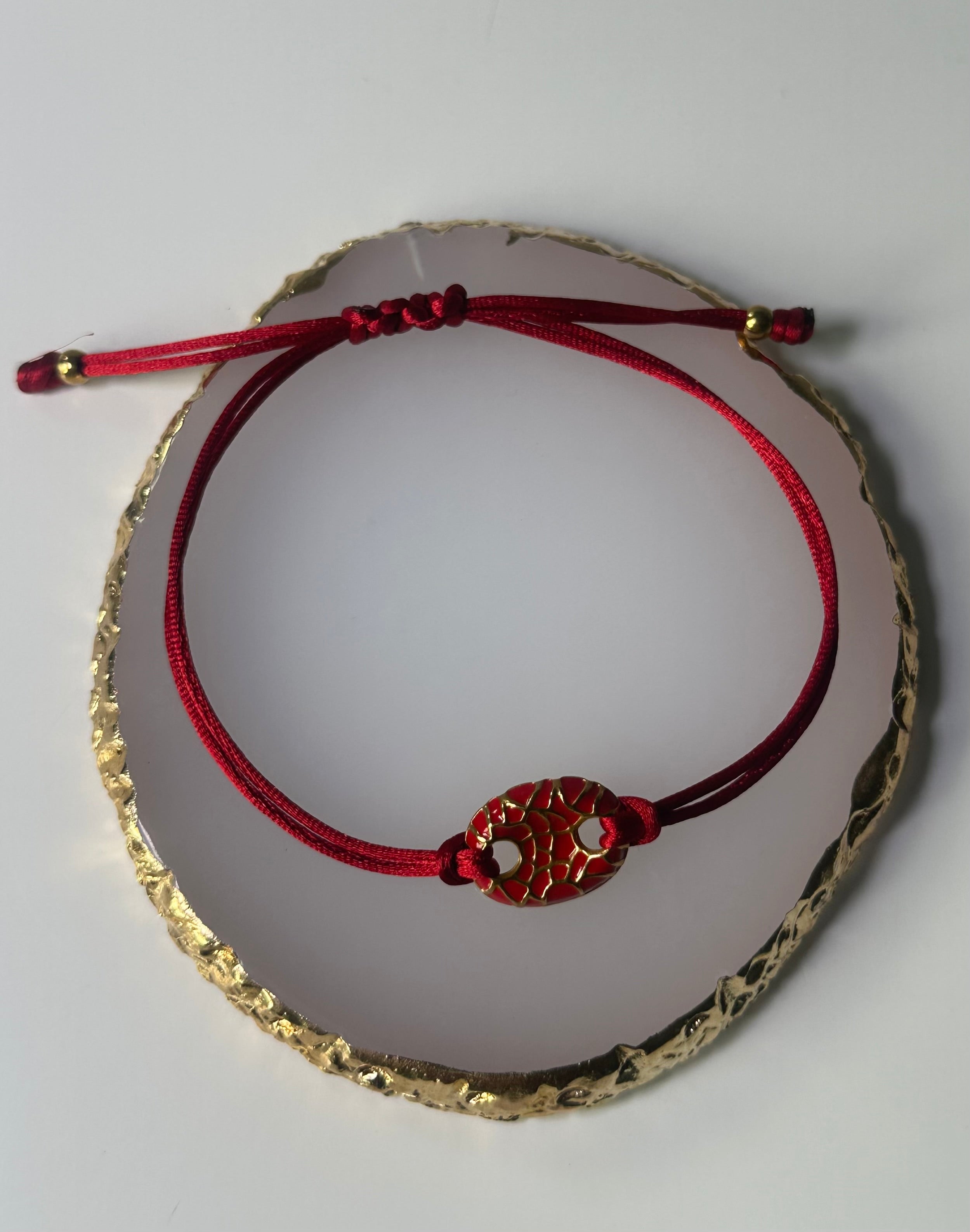 Red and gold adjustable bracelet