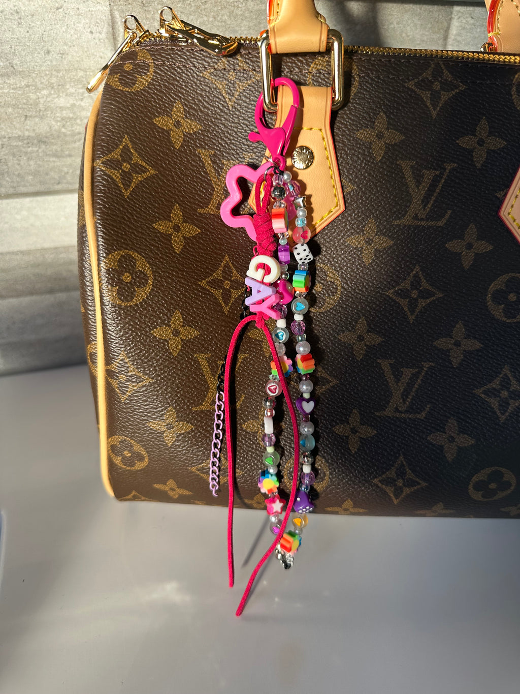 GAY bag charm