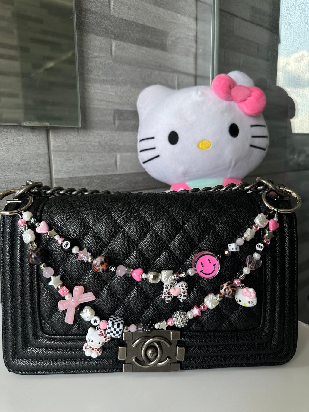 Hello Kitty bag charm (pink smiley)