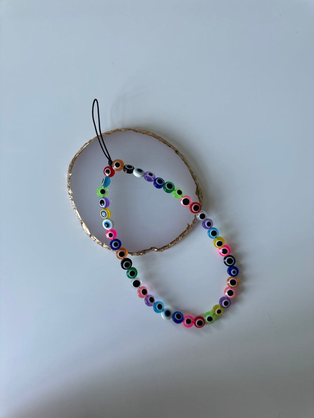 Evil eye phone charm