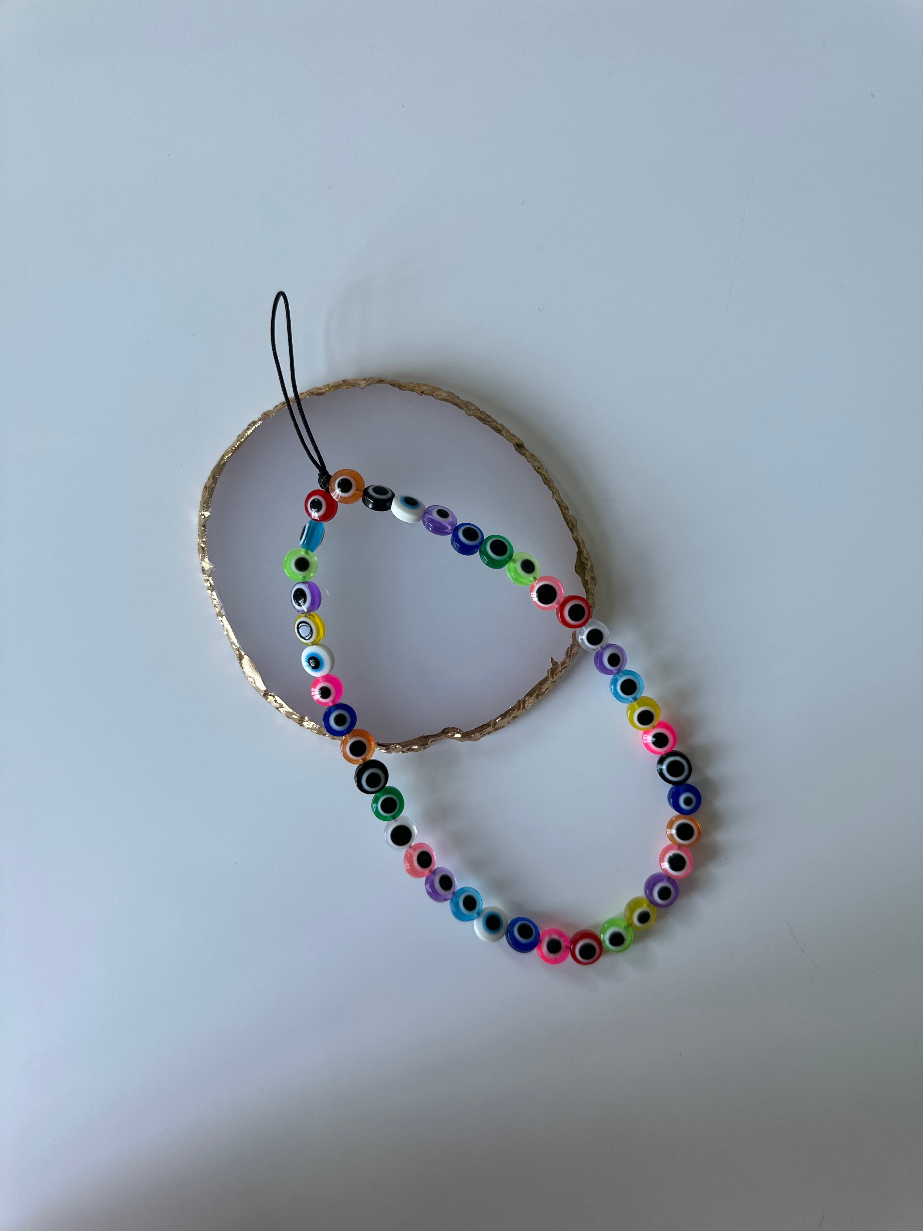 Evil eye phone charm