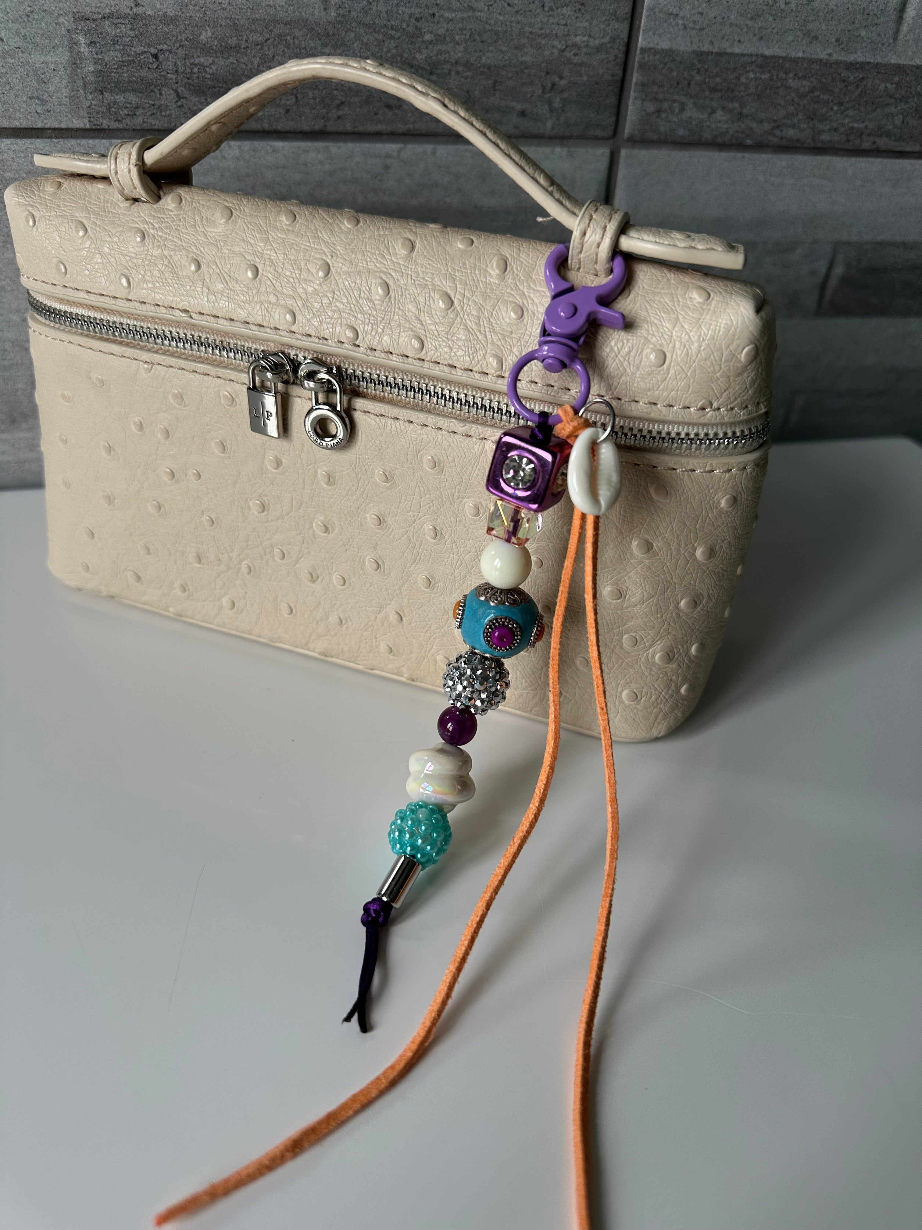 Sandy bag charm