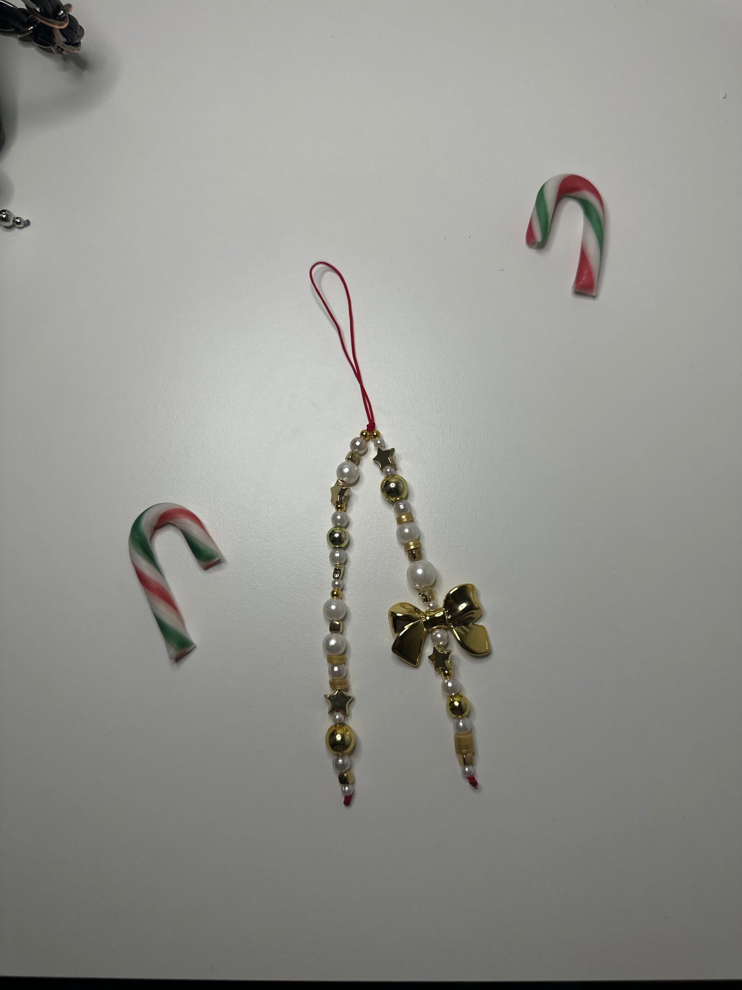 Gold bow charm