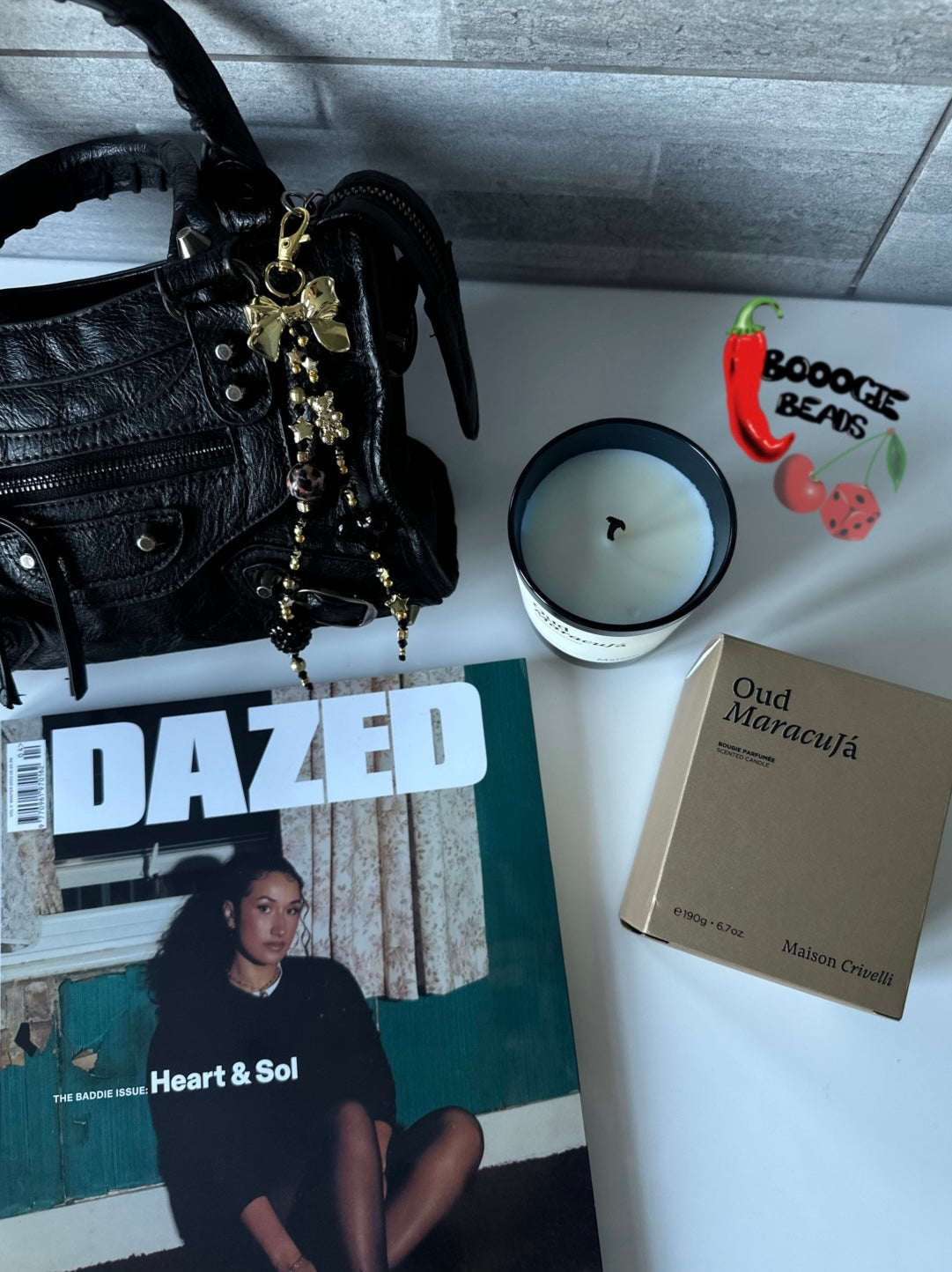 Black ‘n’ gold bag charm