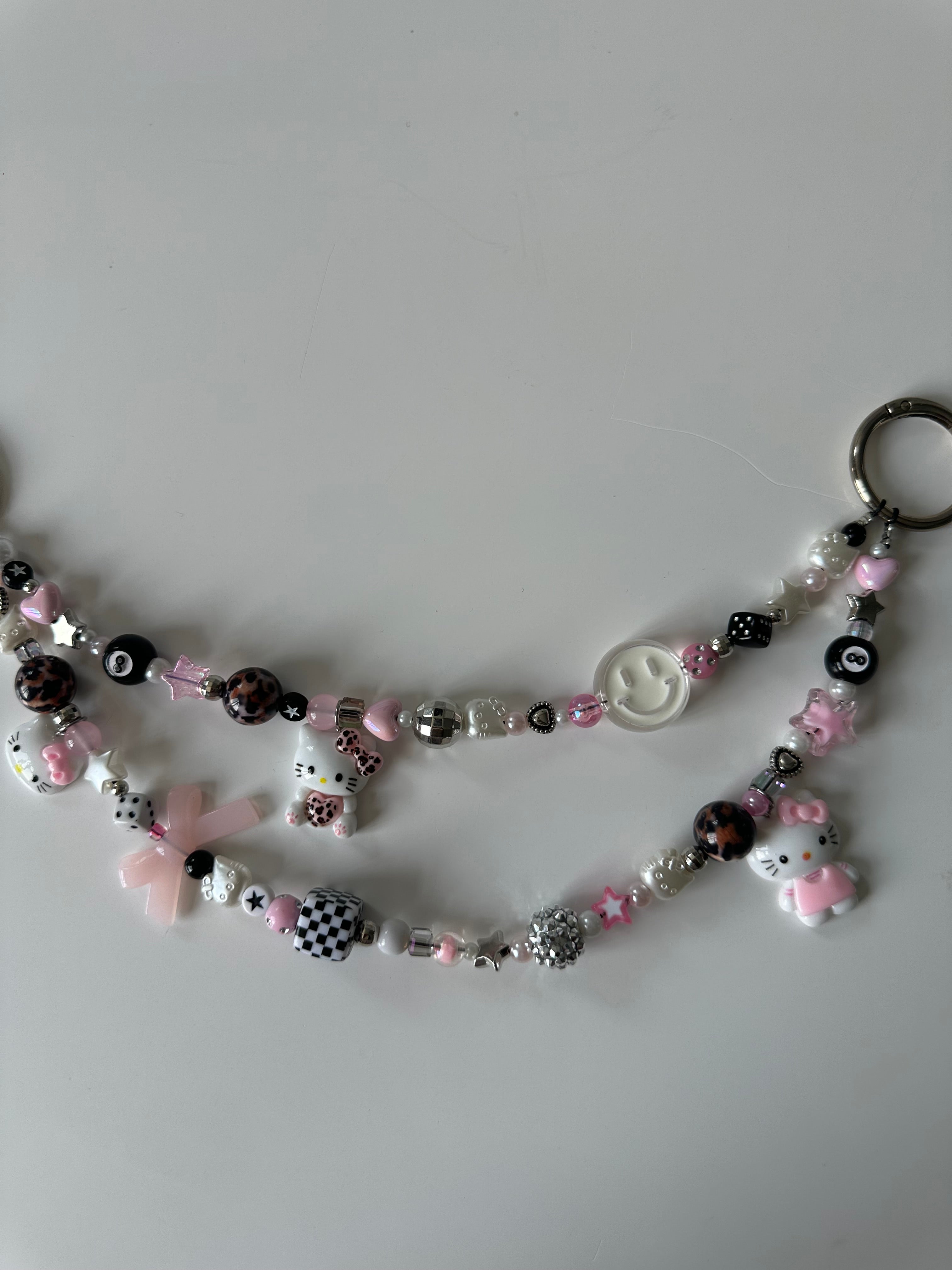 Hello Kitty bag charm (white smiley)
