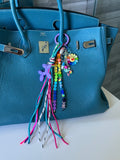 Abby bag charm (purple dog)