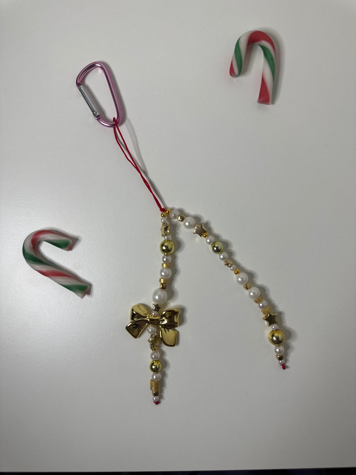 Gold bow charm