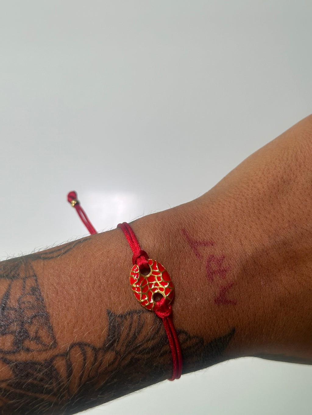 Red and gold adjustable bracelet