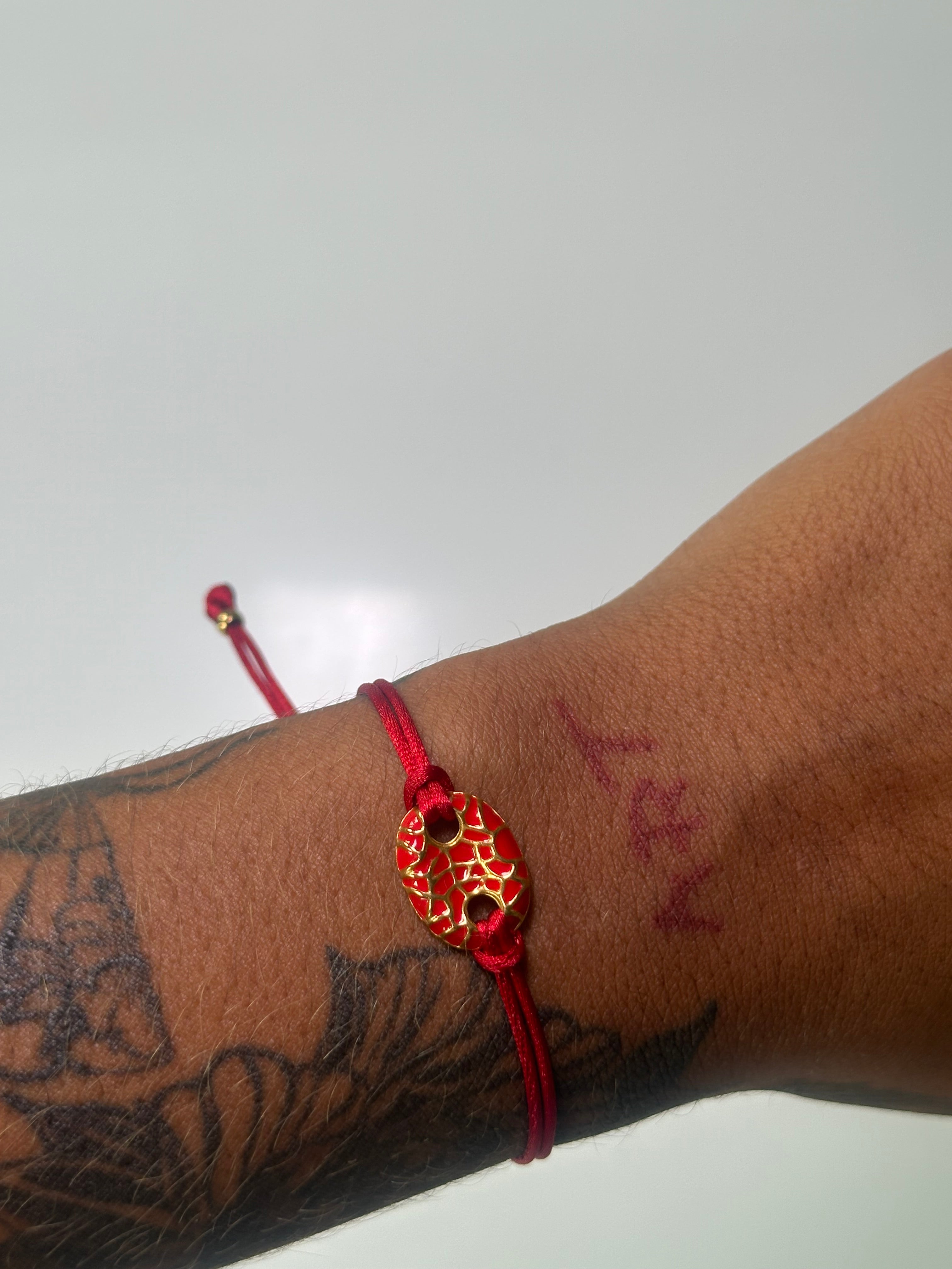 Red and gold adjustable bracelet