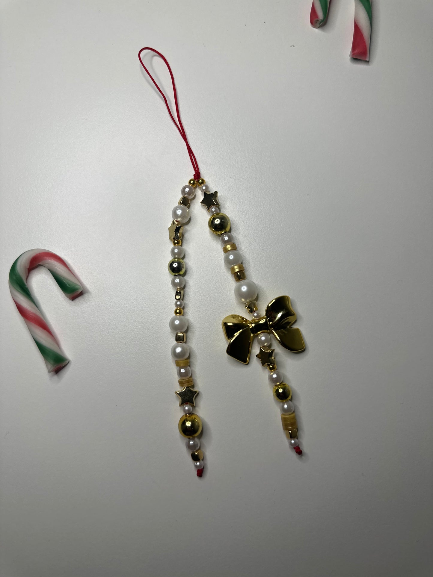 Gold bow charm