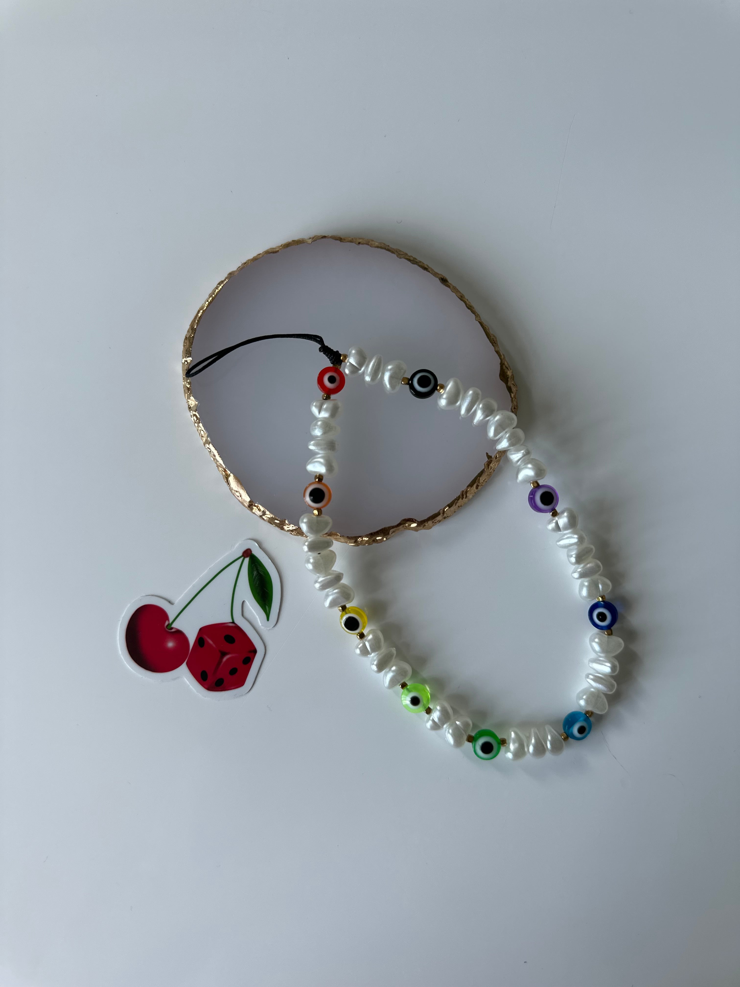 Evil eye phone charm