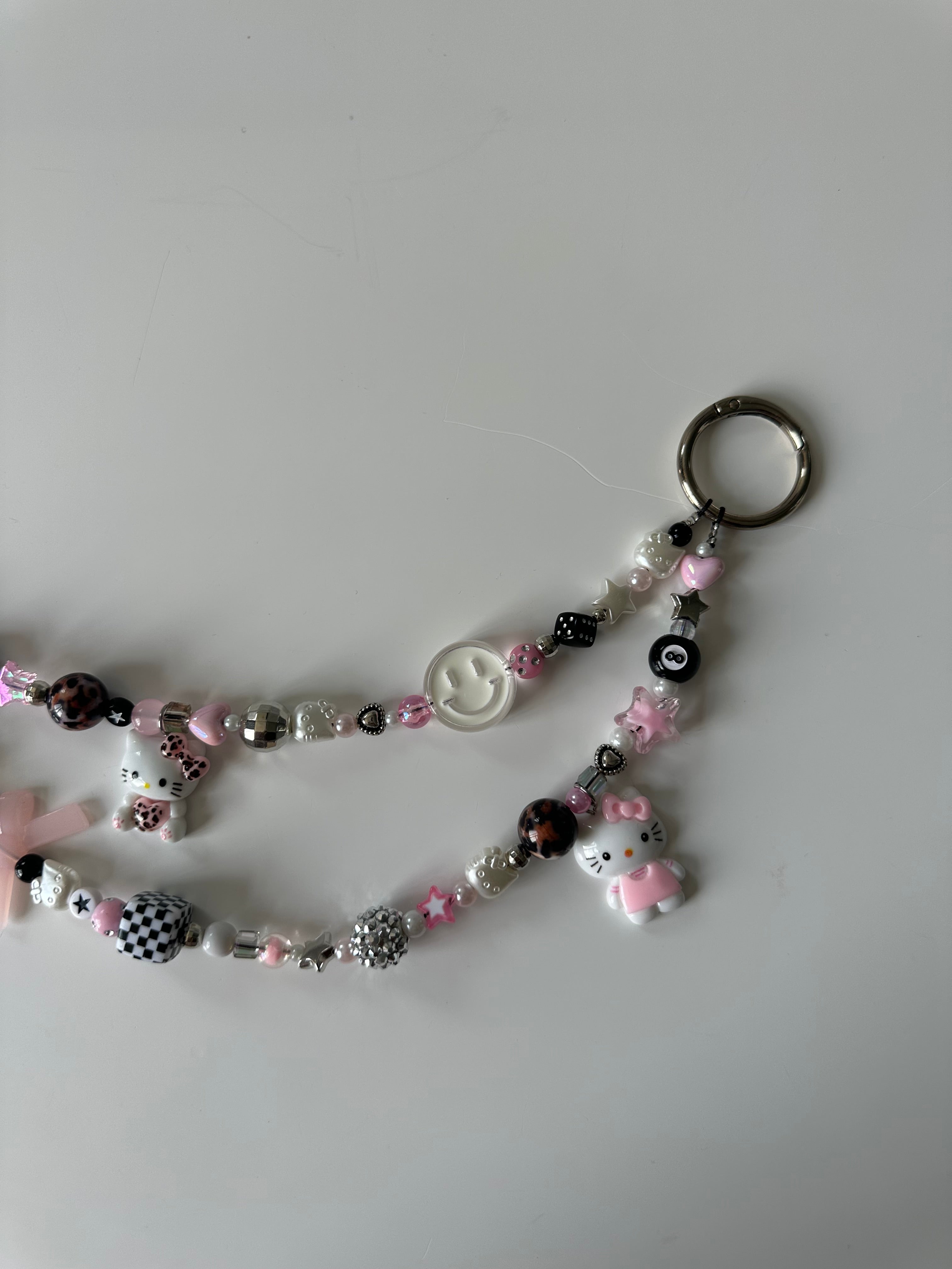 Hello Kitty bag charm (white smiley)