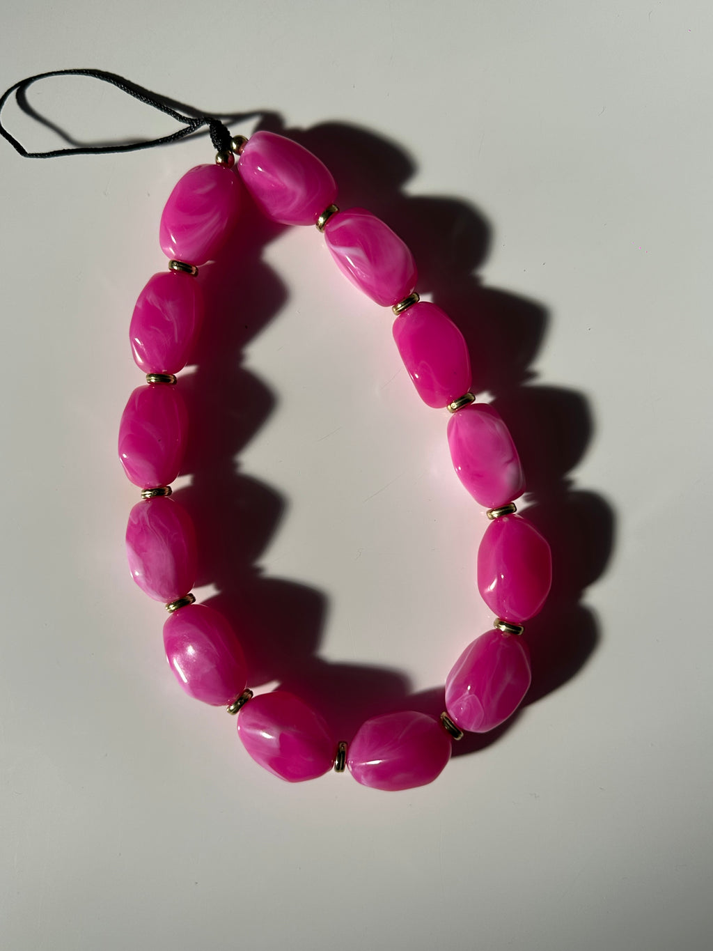 Pink stone phone charm