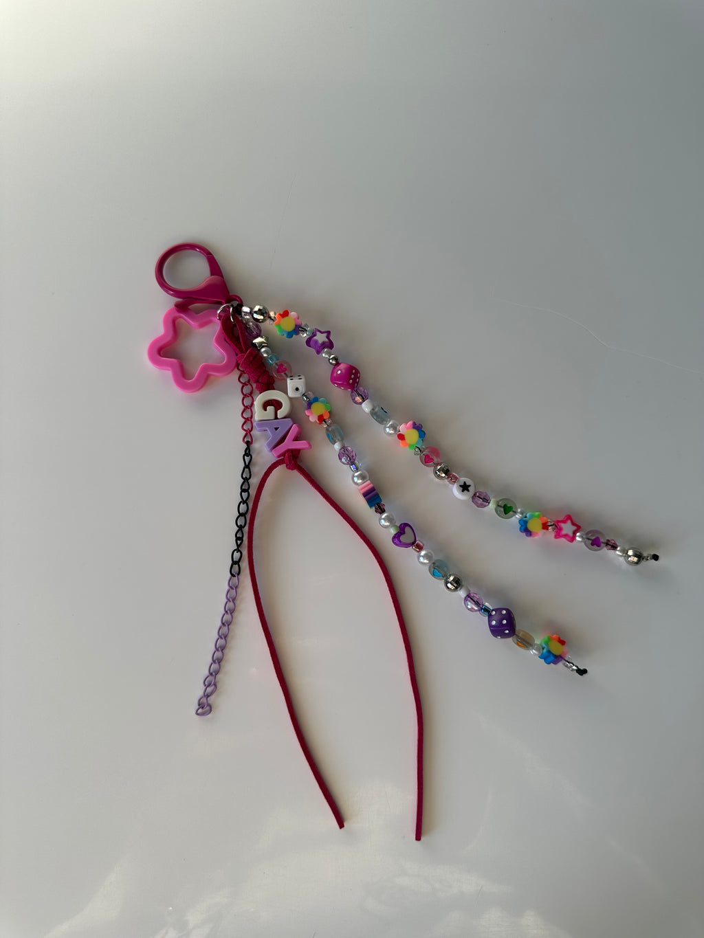 GAY bag charm
