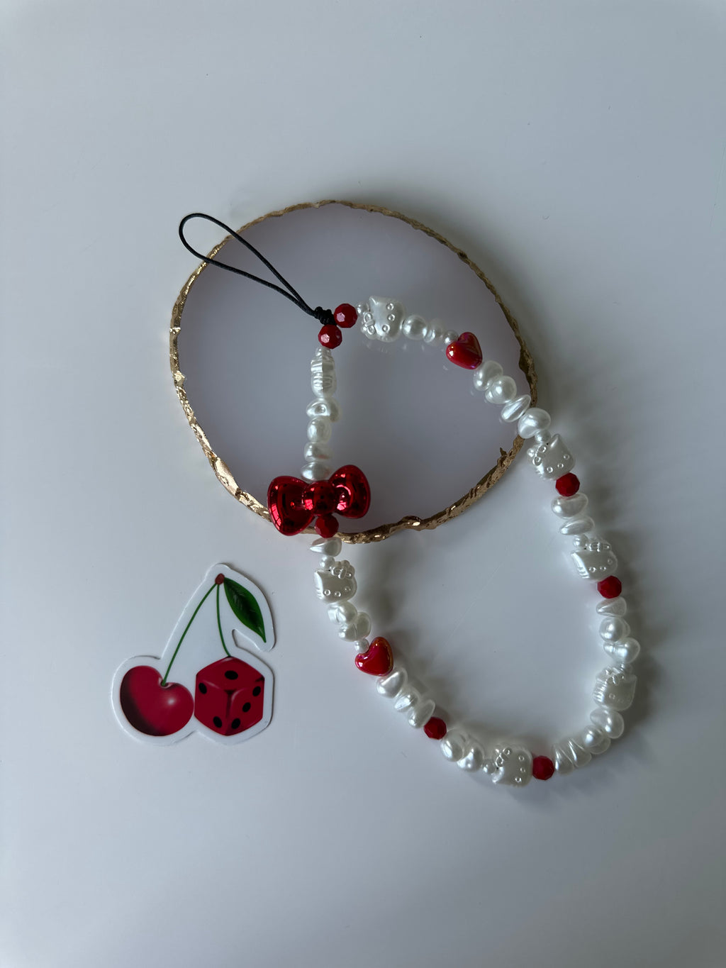 Hello kitty phone charm