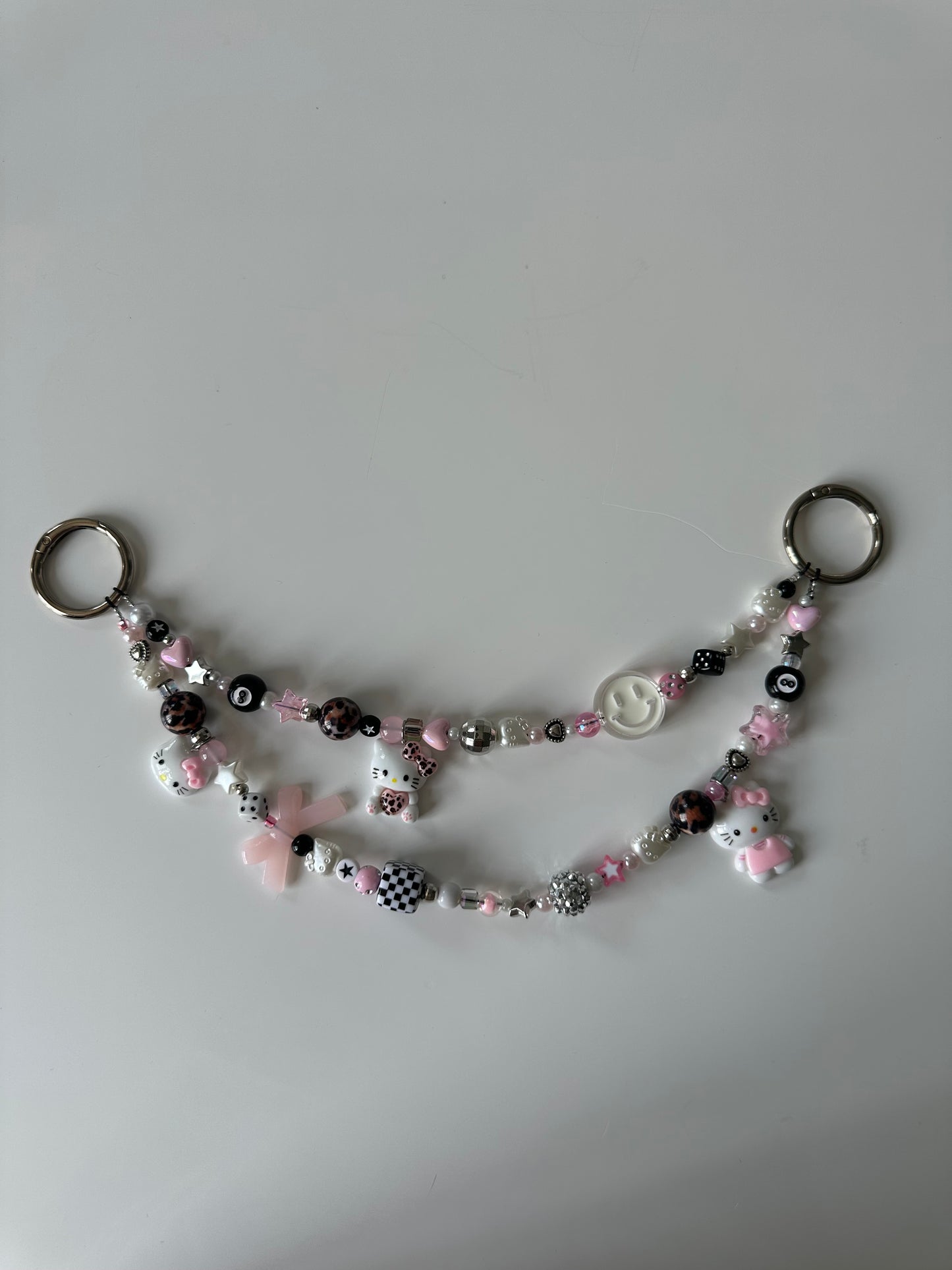 Hello Kitty bag charm (white smiley)