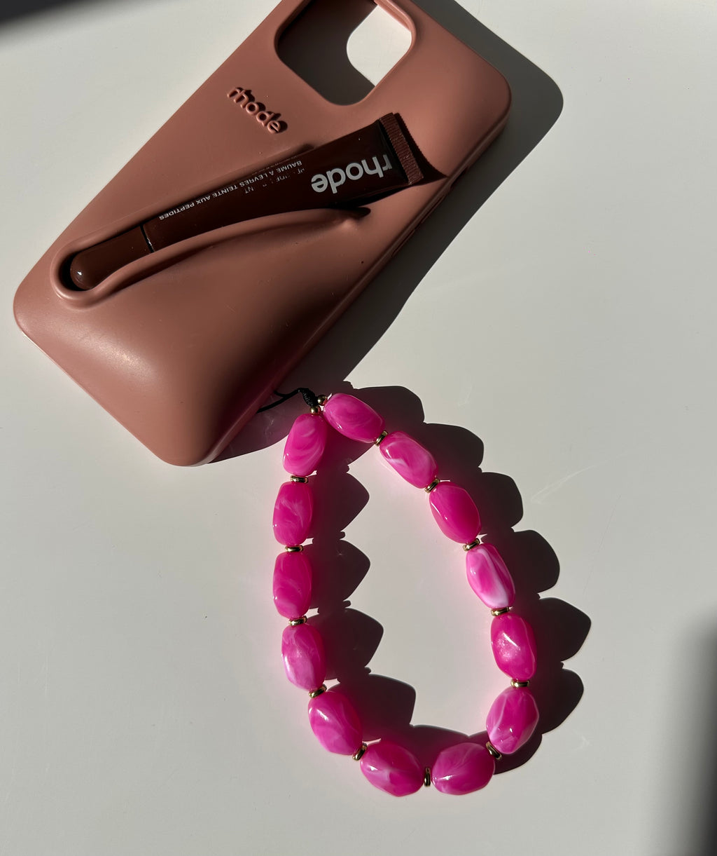 Pink stone phone charm