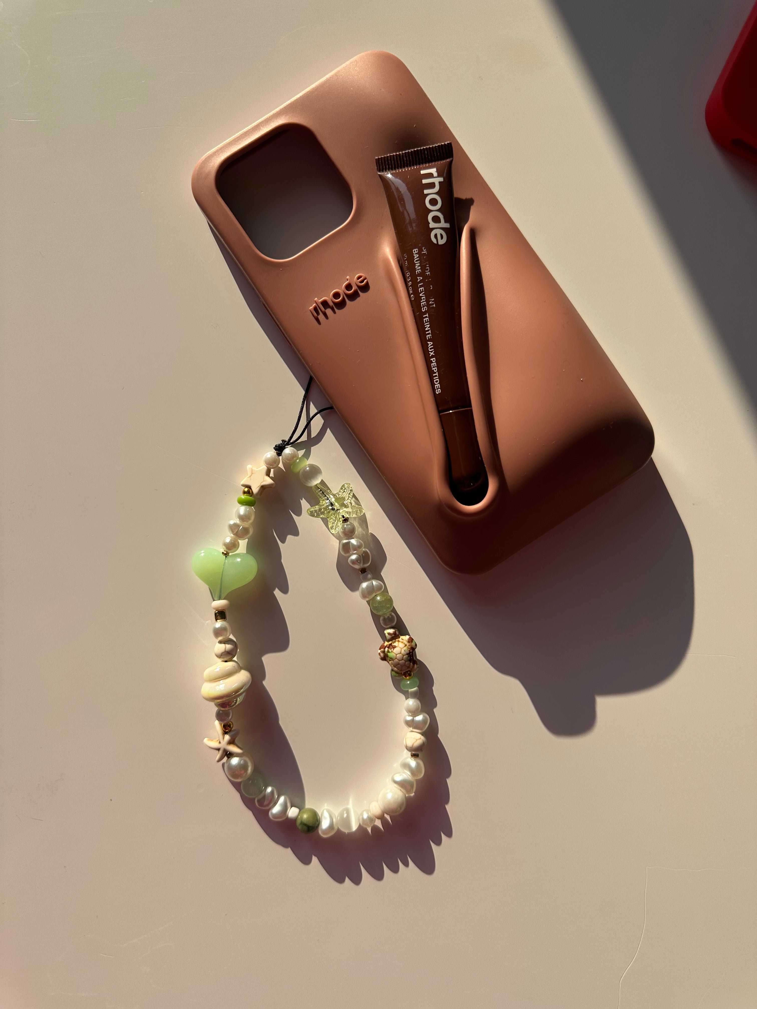 Earthy phone charm