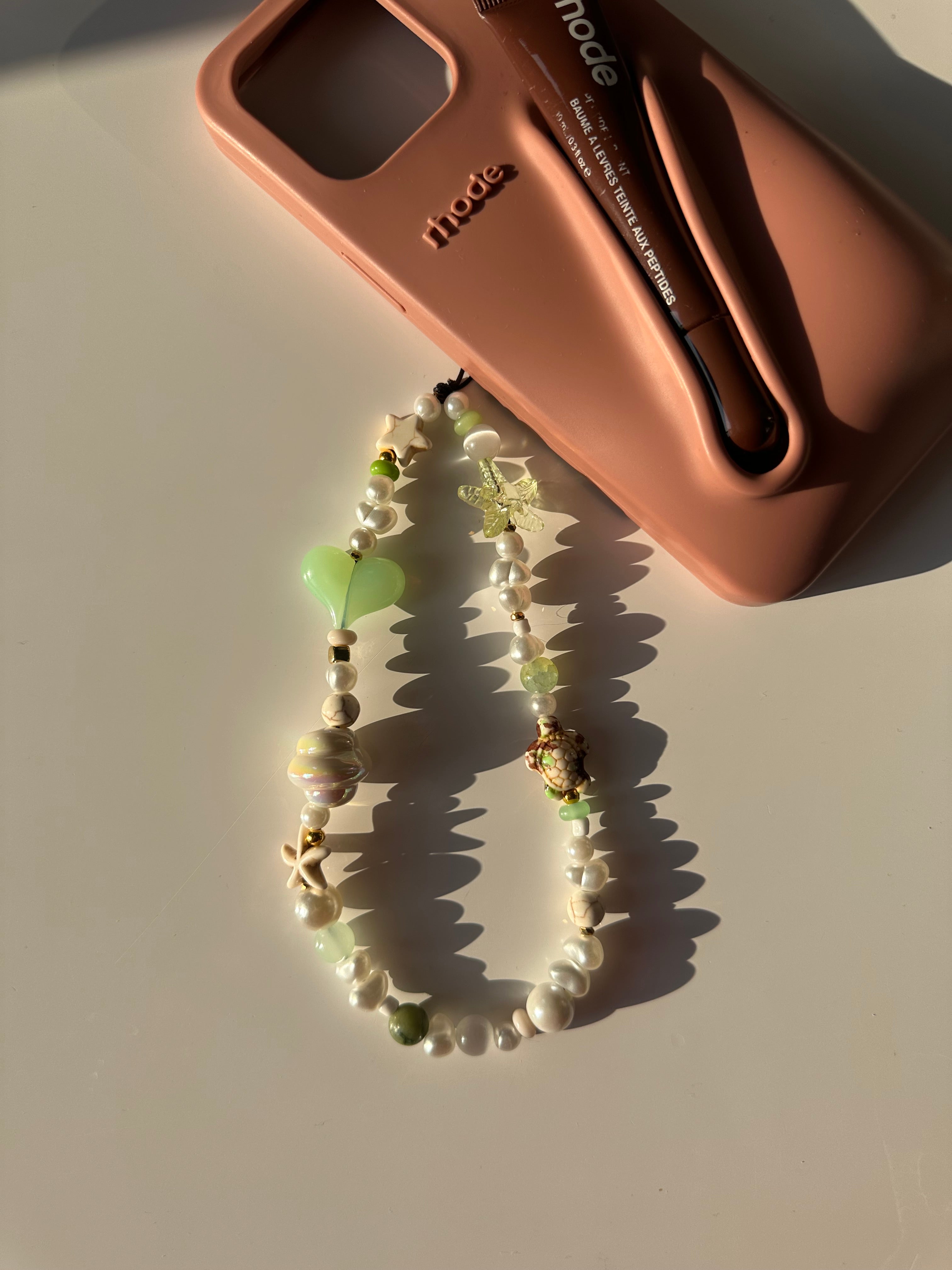 Earthy phone charm